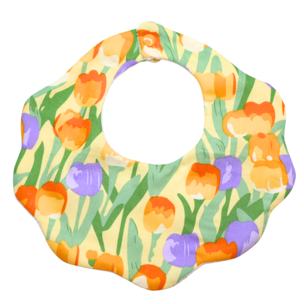 Flora yellow floral cotton baby bib by Rudy & Co