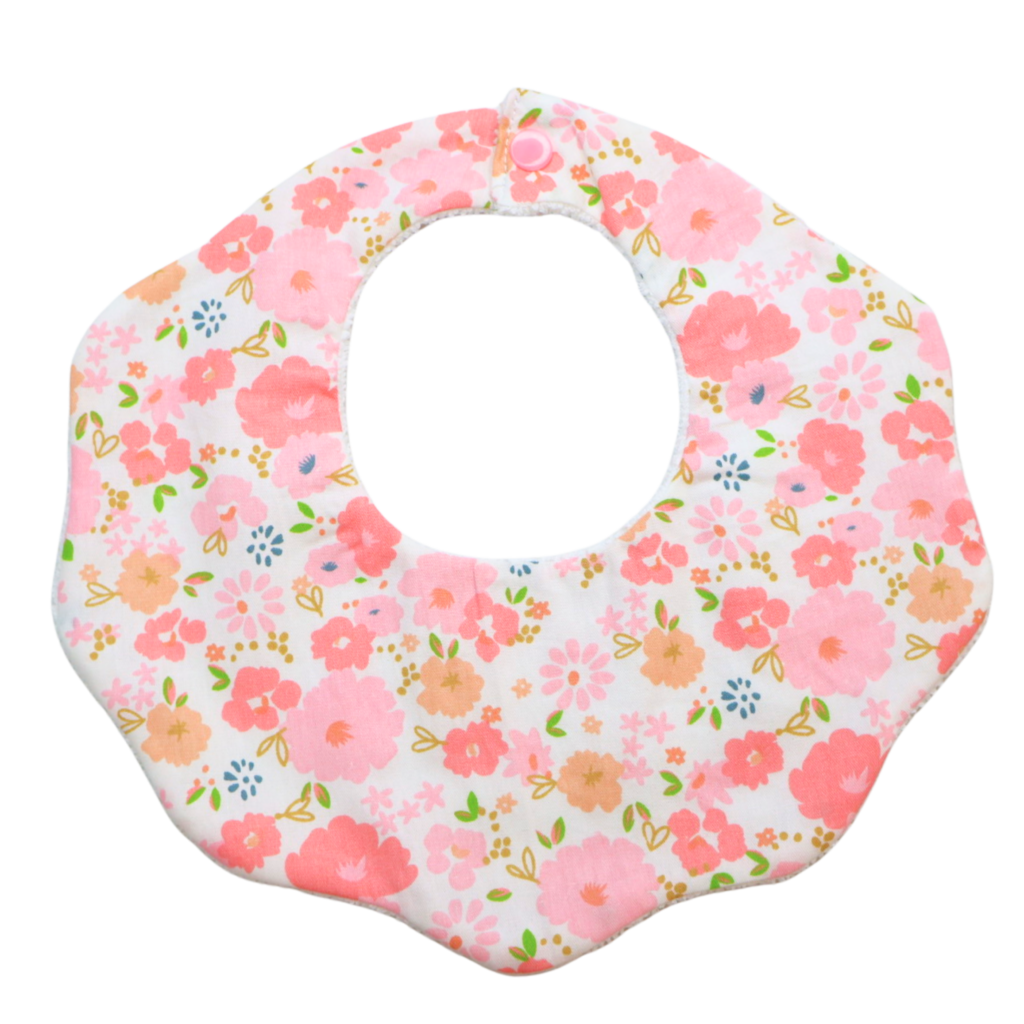 Primrose pink floral cotton baby bib by Rudy & Co